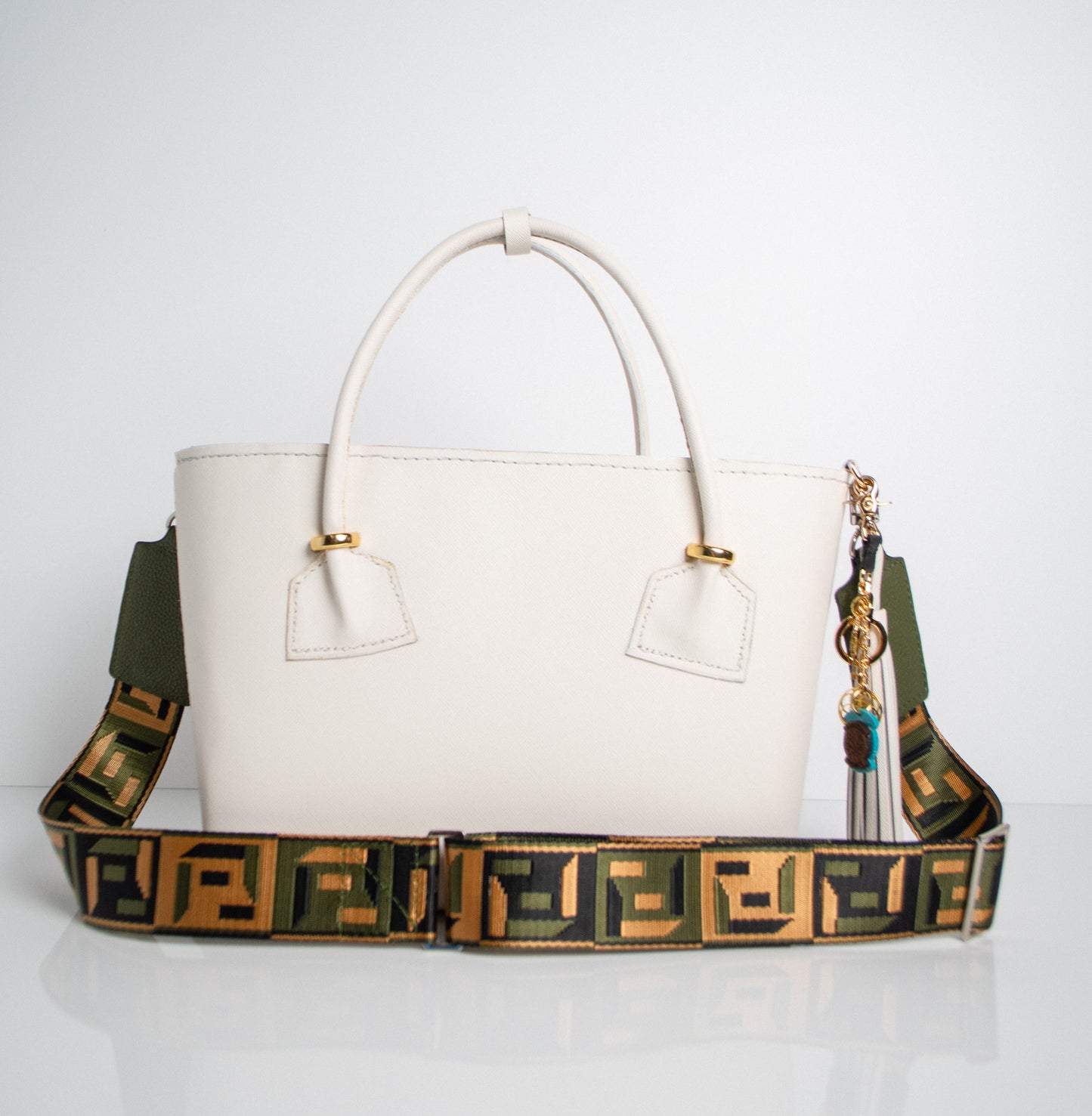 army green handbag strap with gold hardware and togo leather ends